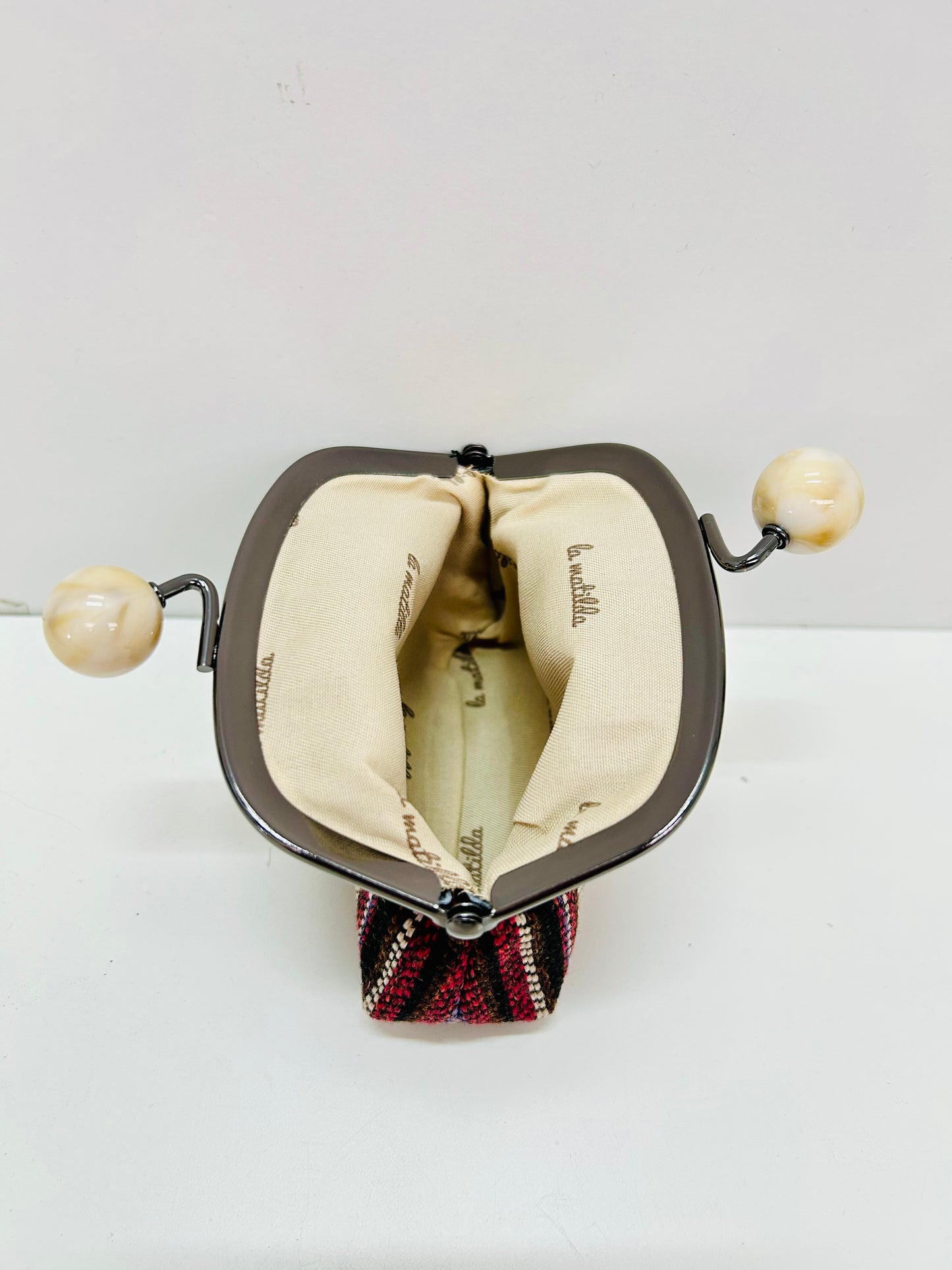 Monedero de Boquilla con Cierre de Bolas Linea Fuego